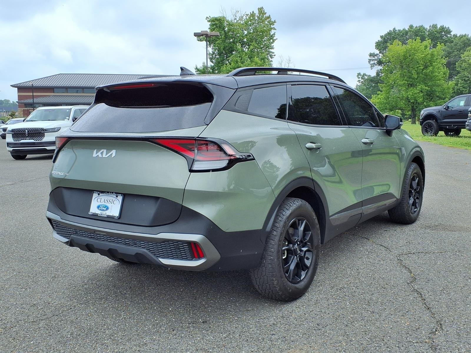 Used 2024 Jungle Green/Ebony Black Roof Kia X-Pro Prestige image 2