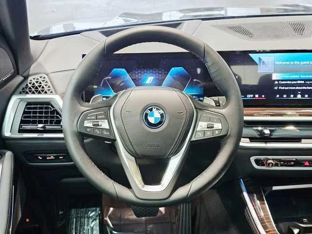 Used 2025 Black Sapphire Metallic BMW xDrive50e image 11