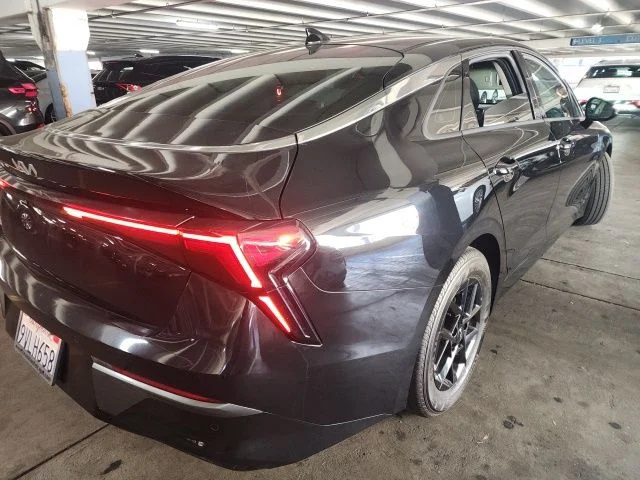 Certified Used 2025 Black Kia LXS image 2