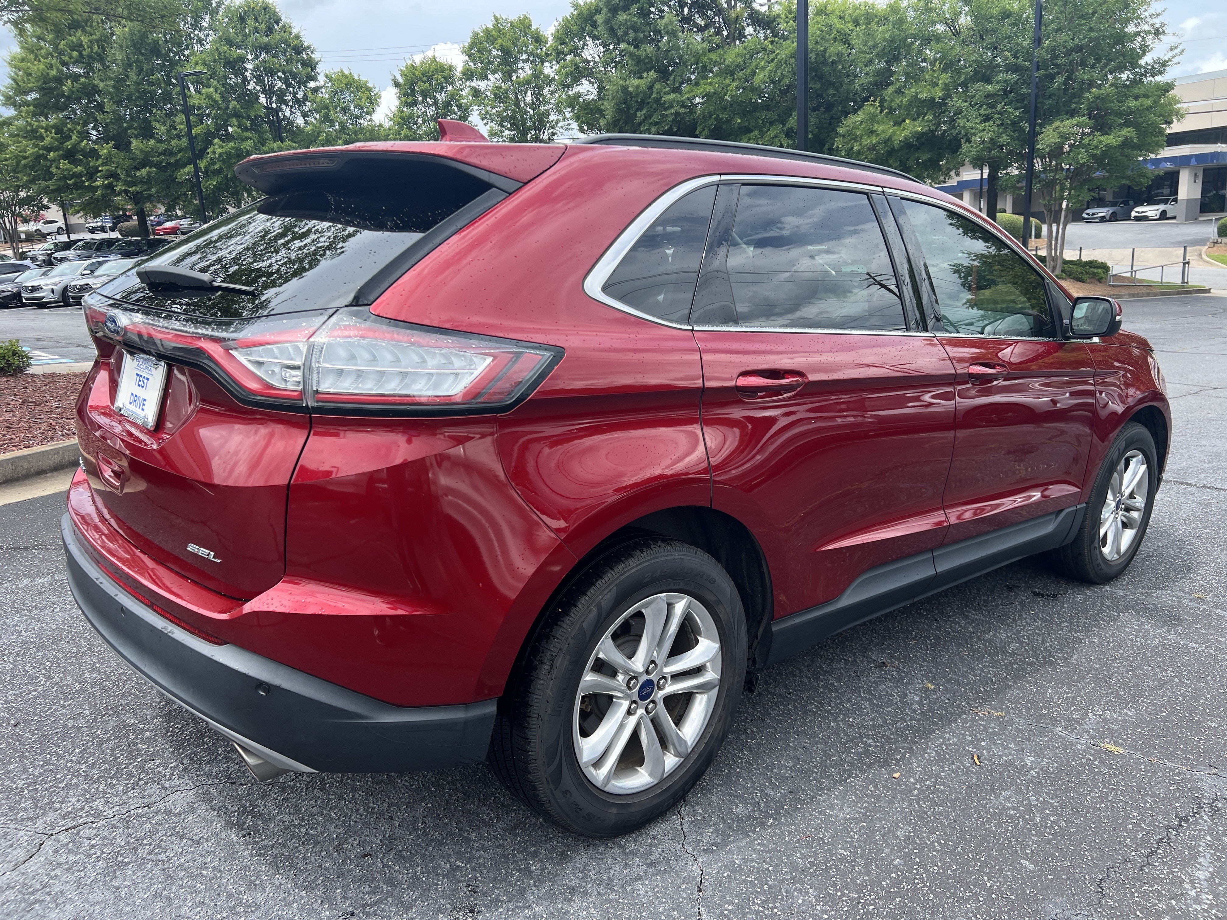Used 2017 Ruby Red Metallic Tinted Clearcoat Ford SEL image 5
