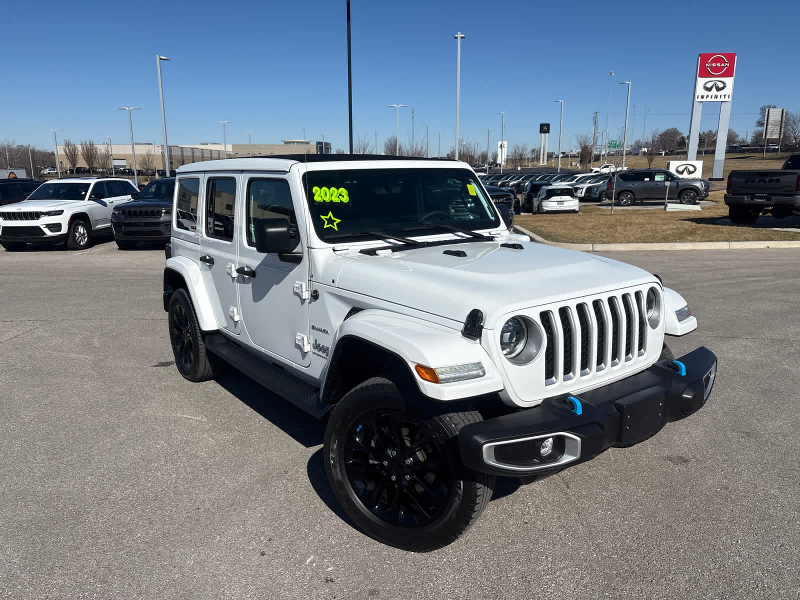 Used 2023 Jeep Wrangler 4xe Sahara 4XE with VIN 1C4JJXP67PW599605 for sale in Kansas City