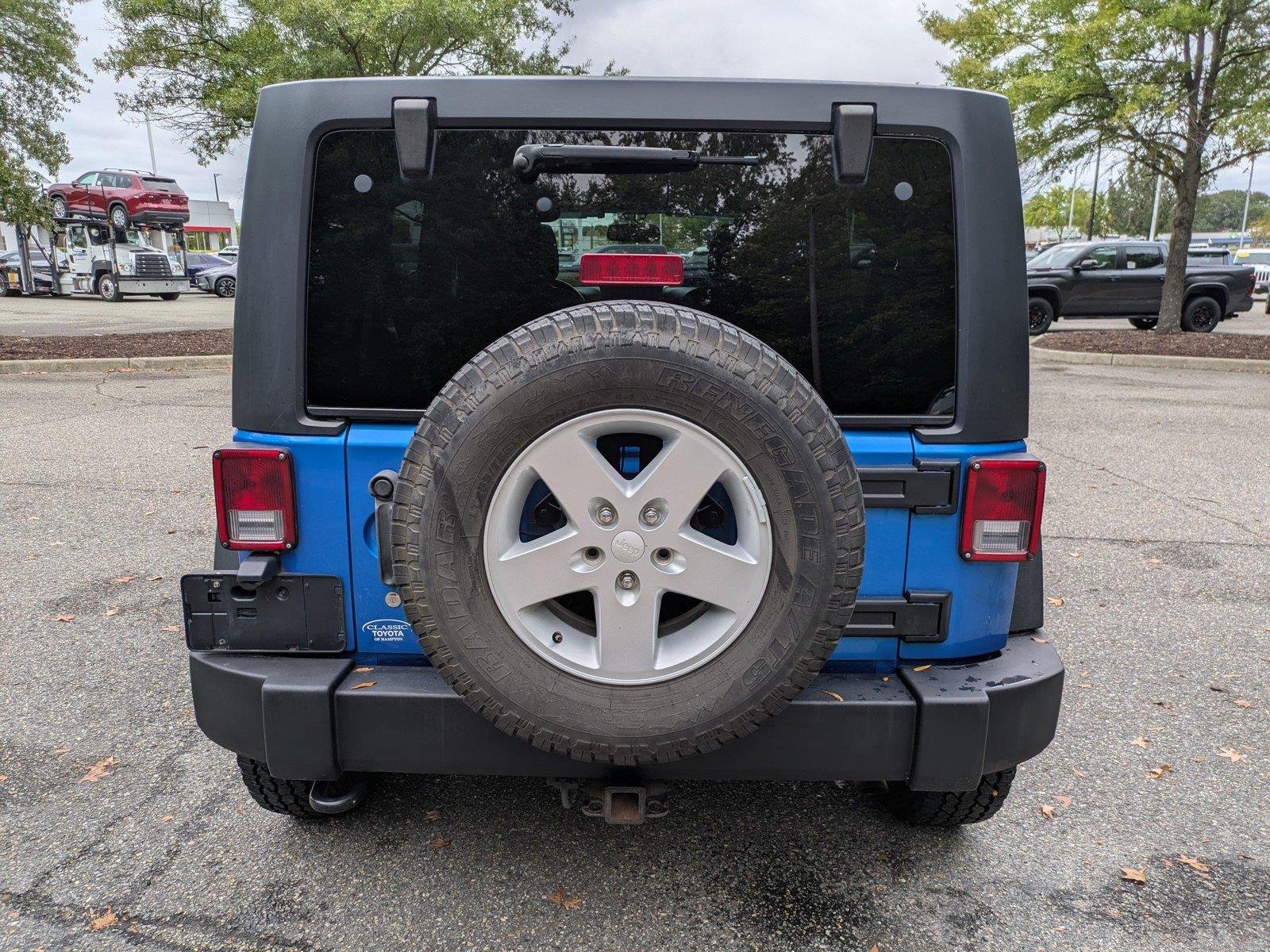 Used 2015 Hydro Blue Pearl Coat Jeep Sport image 5