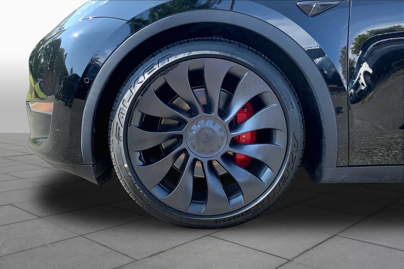 Used 2021 Solid Black Tesla Performance image 10