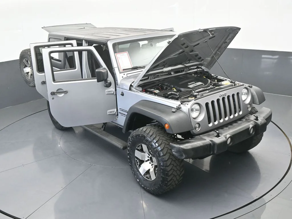 Used 2016 Billet Silver Metallic Clearcoat Jeep Unlimited Sport image 61