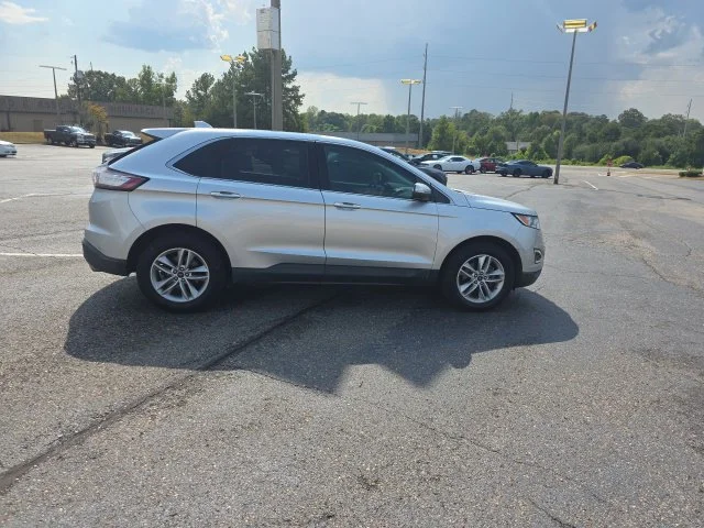 Used 2015 Ingot Silver Ford SEL image 2