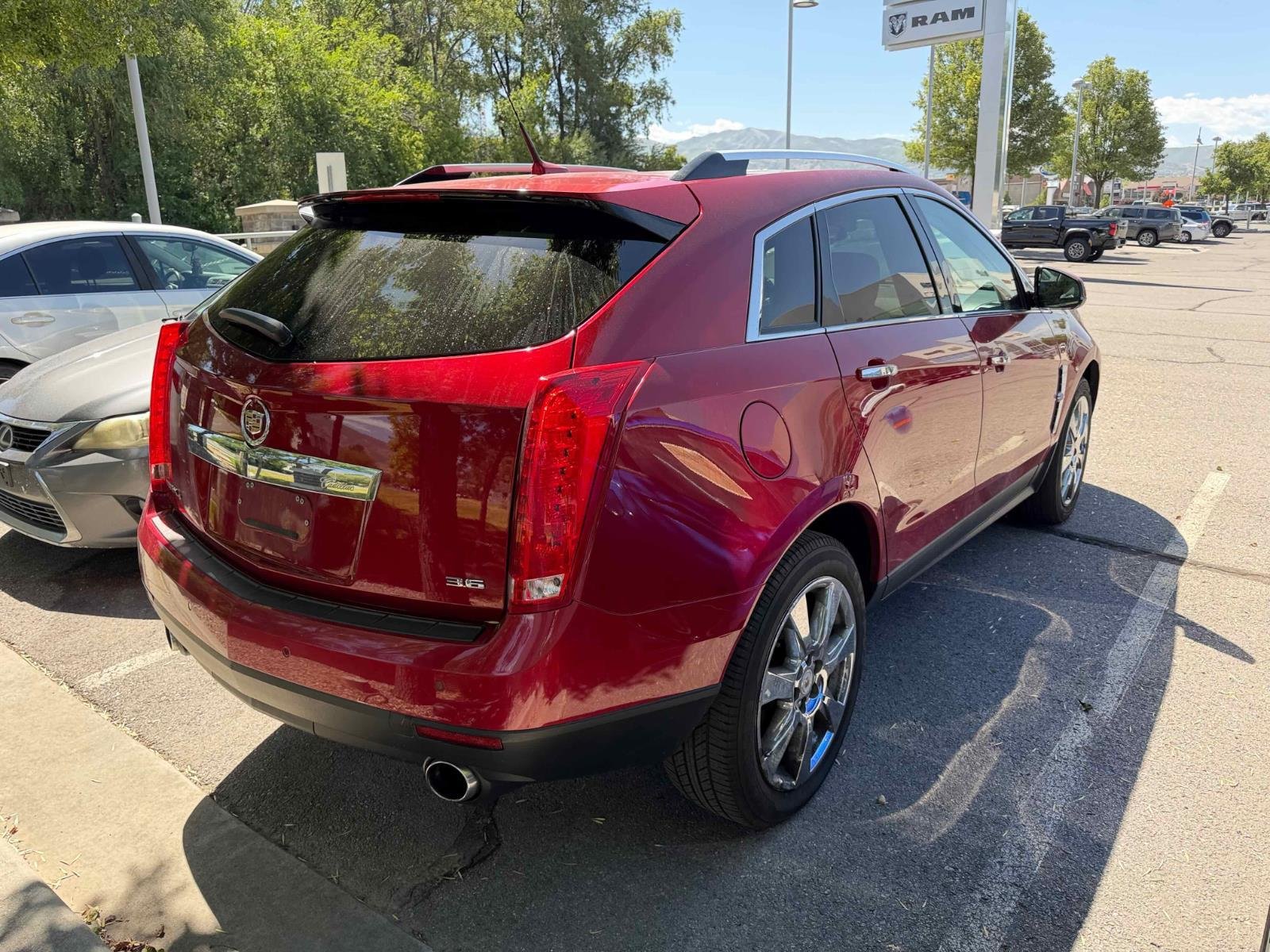 Used 2012 Crystal Red Tintcoat Cadillac Performance Collection image 8