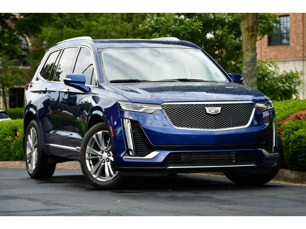 Used 2023 Opulent Blue Metallic Cadillac FWD Premium Luxury image 1