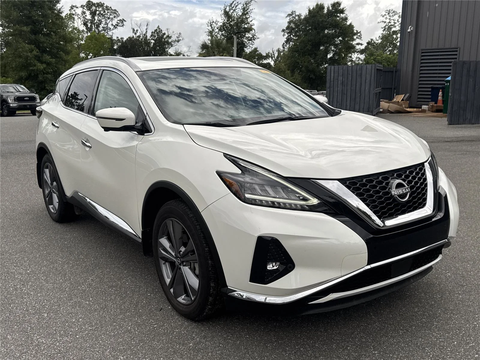 Used 2024 Pearl White Tricoat Nissan Platinum image 1
