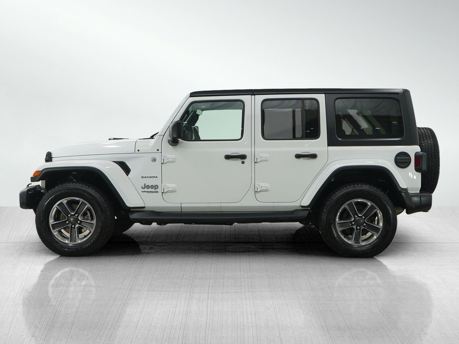Used 2019 Jeep Wrangler Unlimited Sahara with VIN 1C4HJXEN9KW558006 for sale in Wayzata, Minnesota