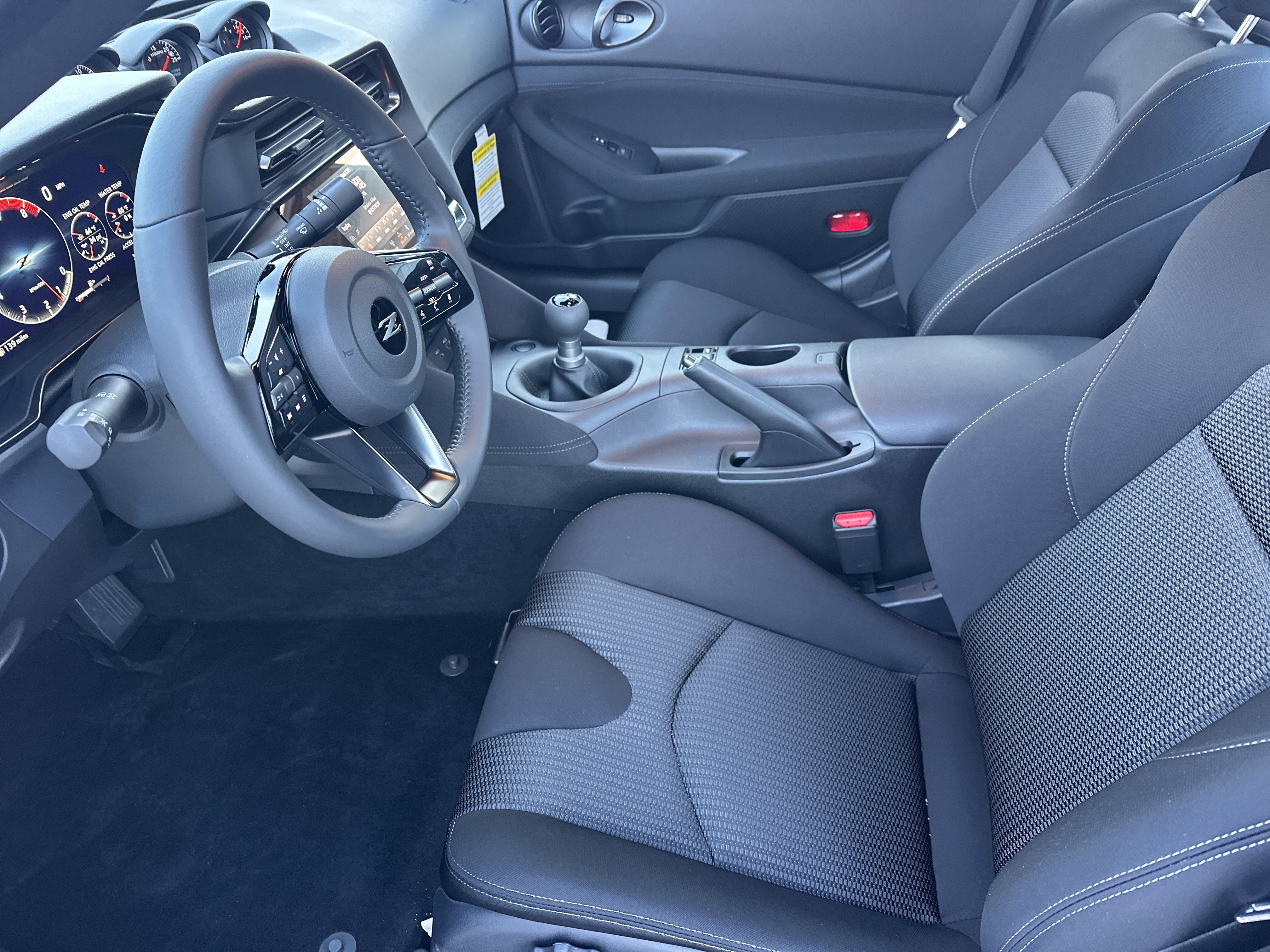 New 2026 Solid Red/Super Black Nissan Sport image 10