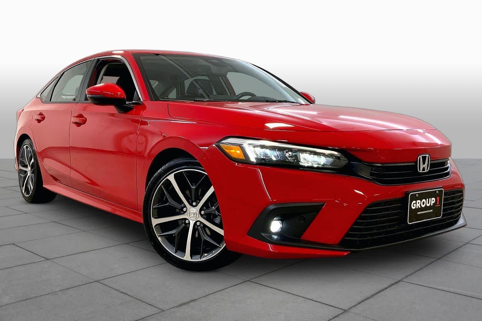Used 2022 Honda Civic Touring with VIN 2HGFE1F9XNH301497 for sale in Kansas City
