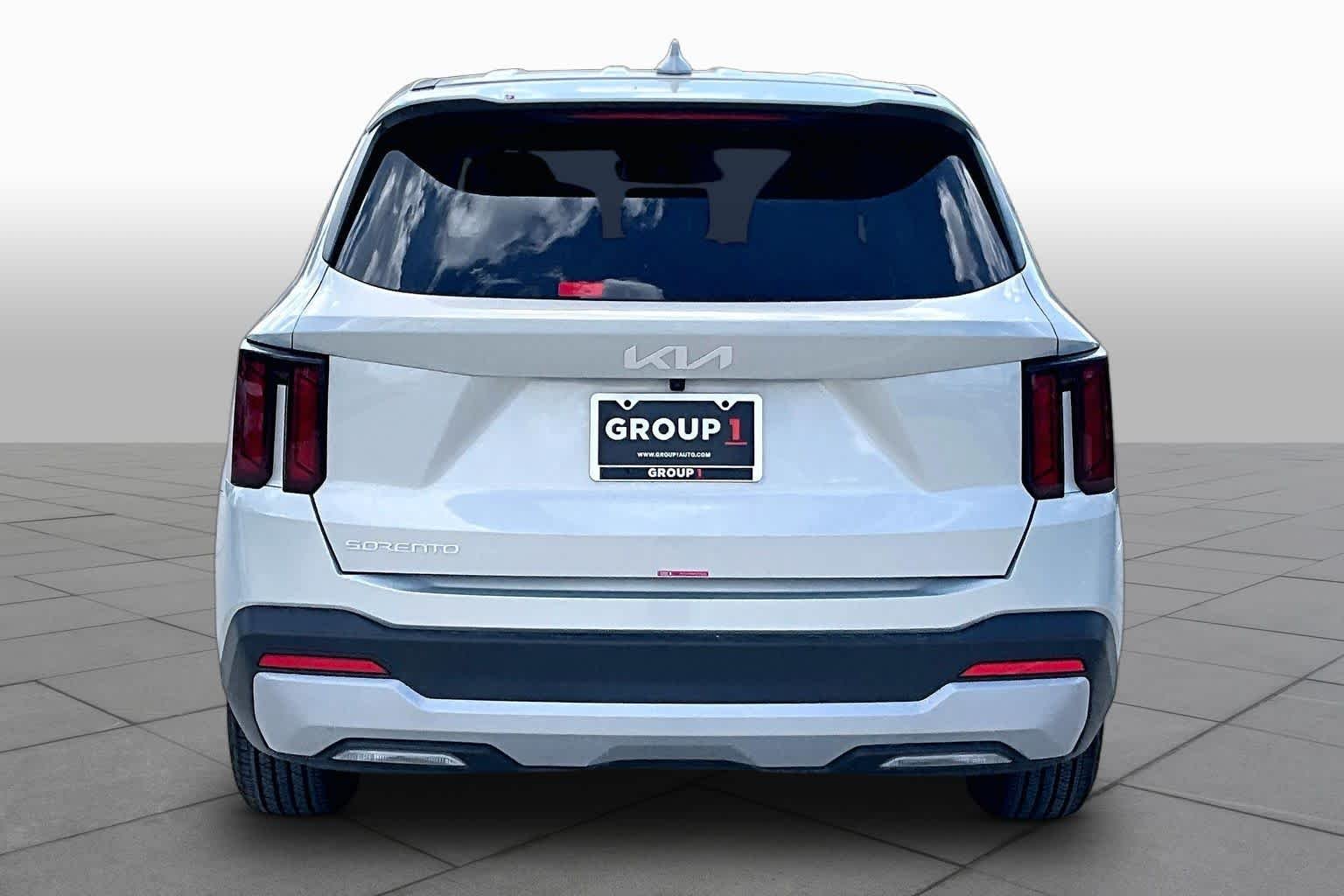 New 2026 Ivory Silver Kia LX image 5