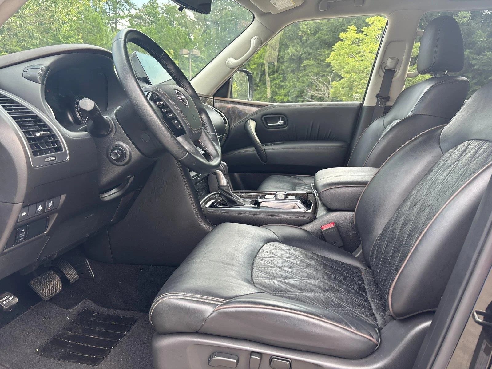 Used 2024 Super Black Nissan Platinum image 15