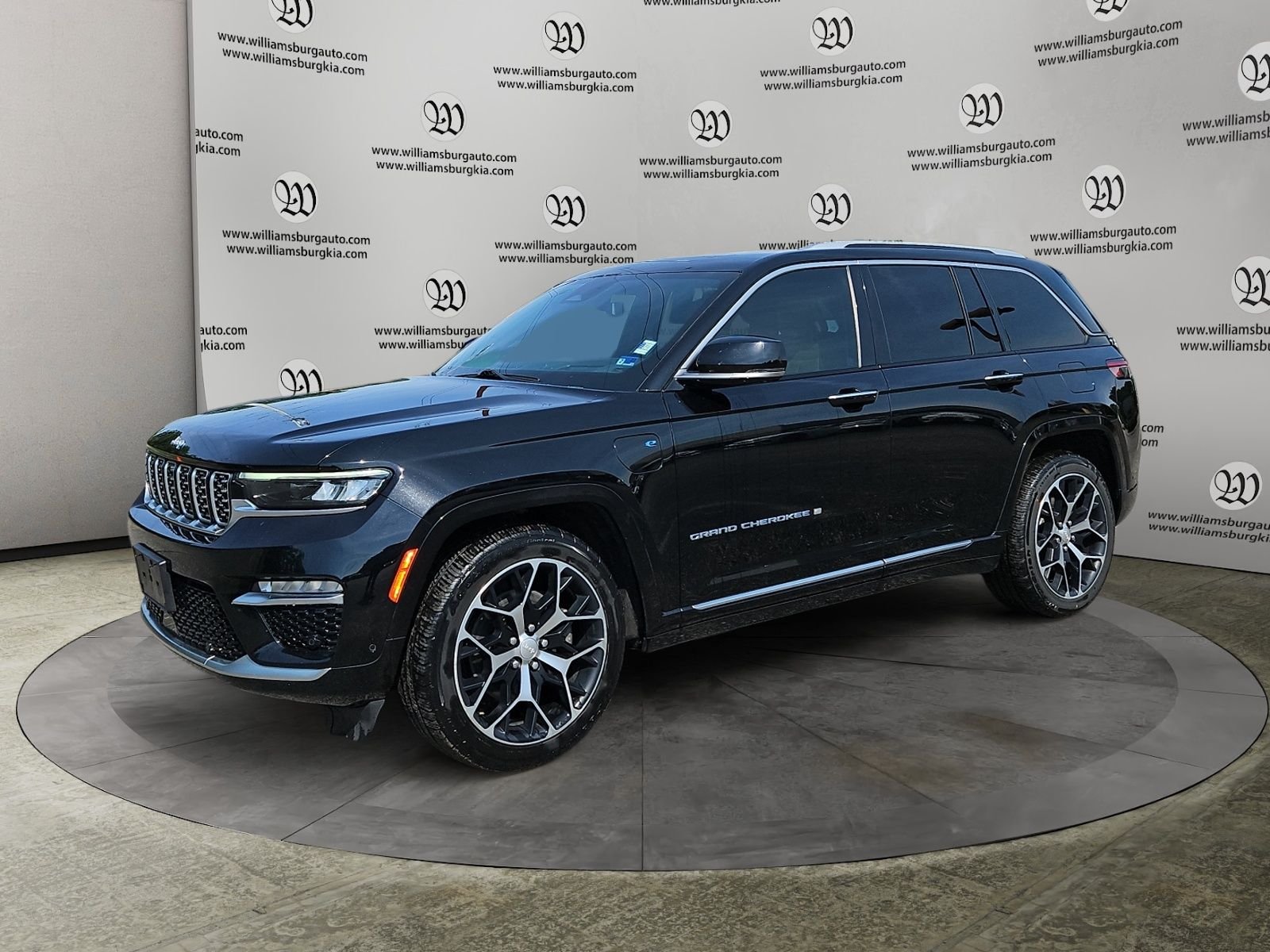 Used 2022 Black Jeep Summit Reserve 4xe image 1