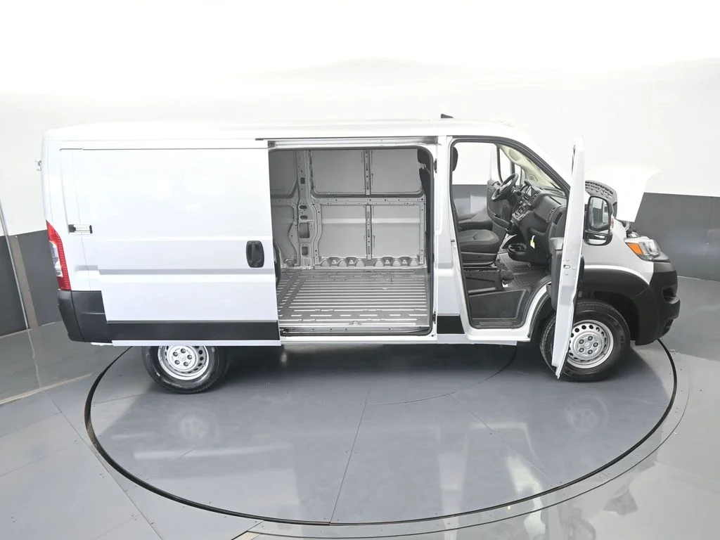 Used 2025 Bright Silver Clearcoat Metallic Ram Low Roof image 60