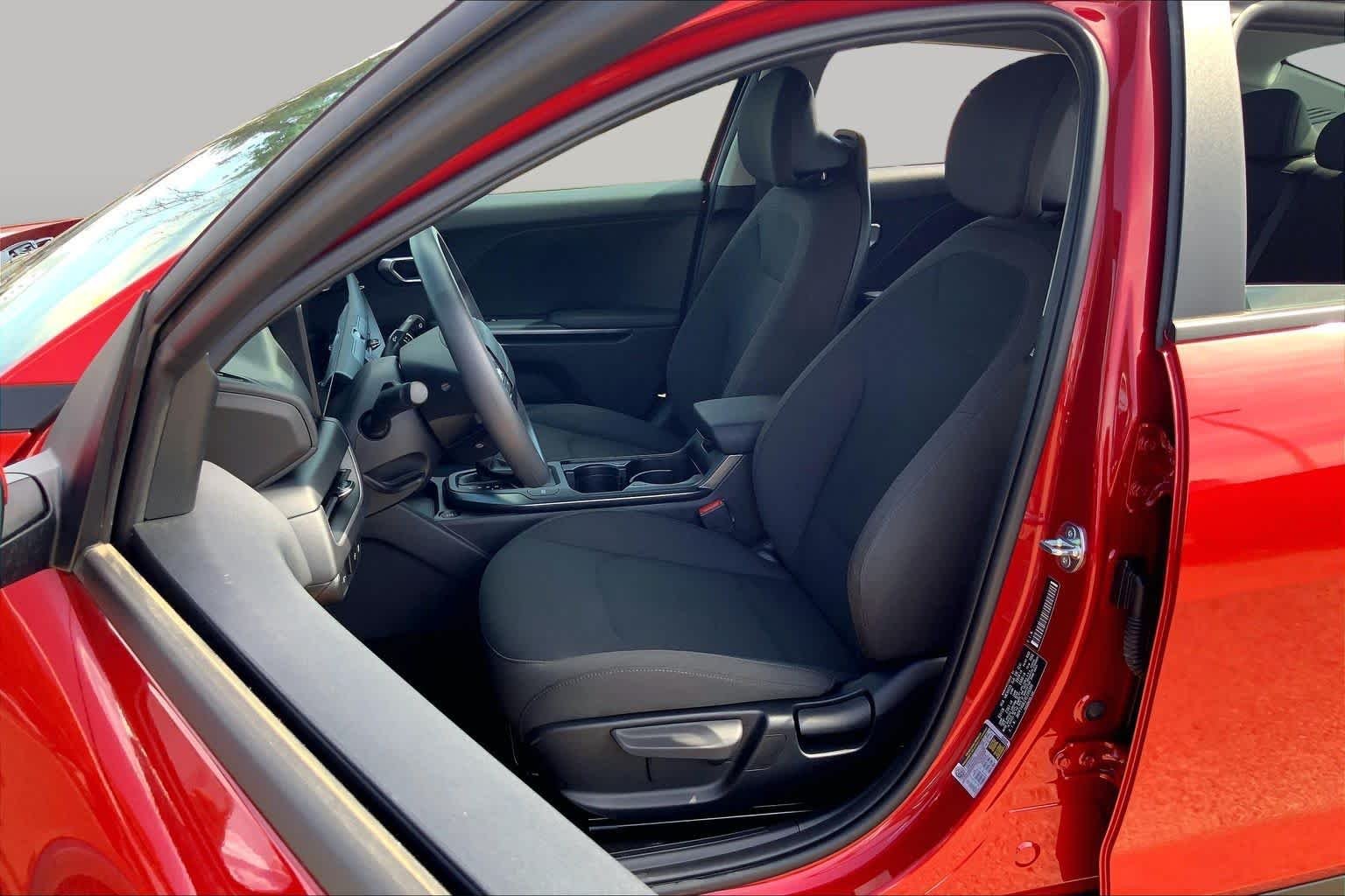 Used 2026 Currant Red Kia LXS image 8