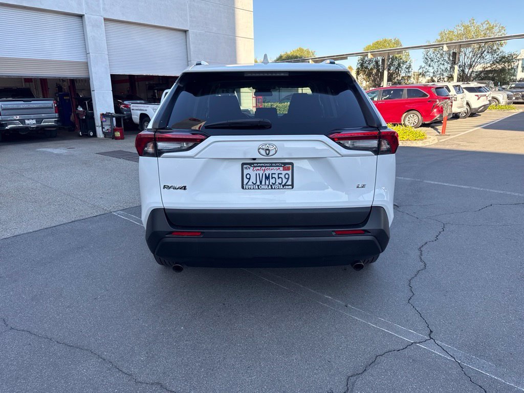Used 2021 White Toyota LE image 6