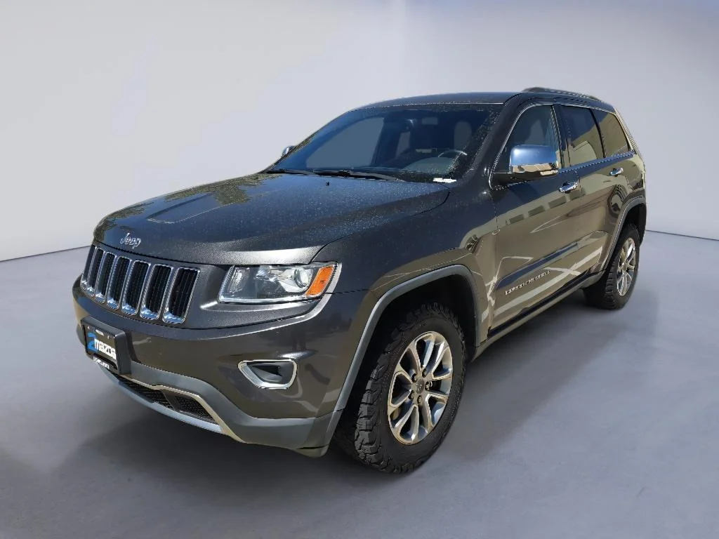 Used 2015 Granite Crystal Metallic Clearcoat Jeep Limited image 1