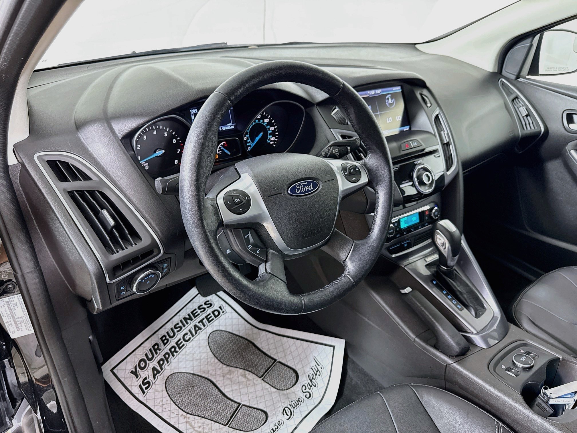 Used 2014 Tuxedo Black Metallic Ford Titanium image 9