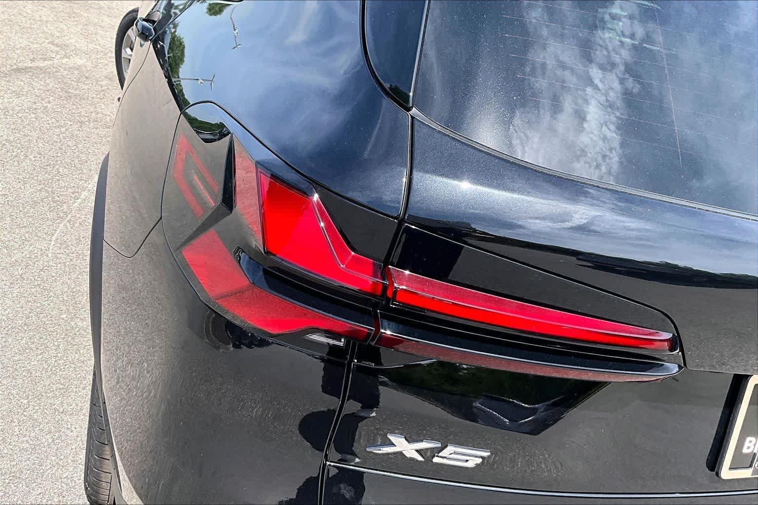 New 2026 Black Sapphire Metallic BMW sDrive40i image 14