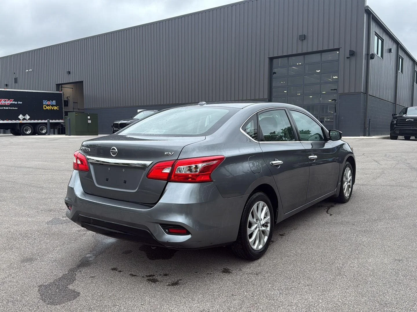 Used 2019 Gun Metallic Nissan SV image 3