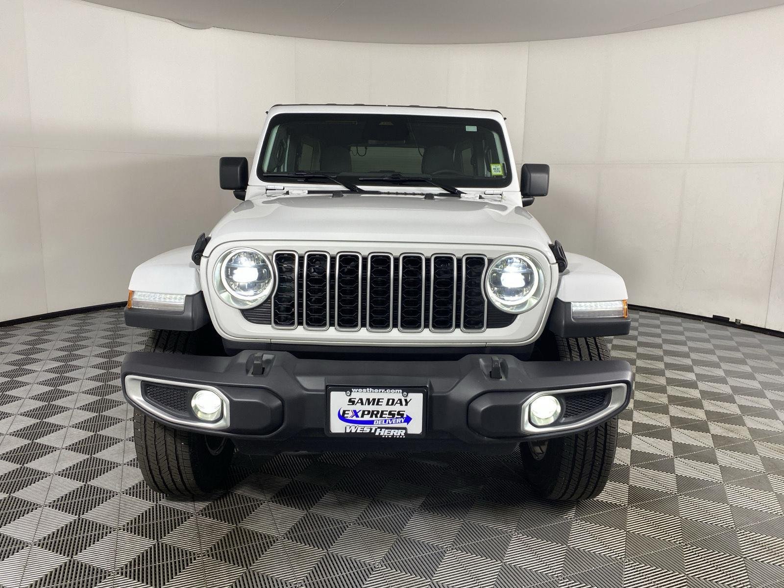 Used 2026 Bright White Jeep Sahara image 6