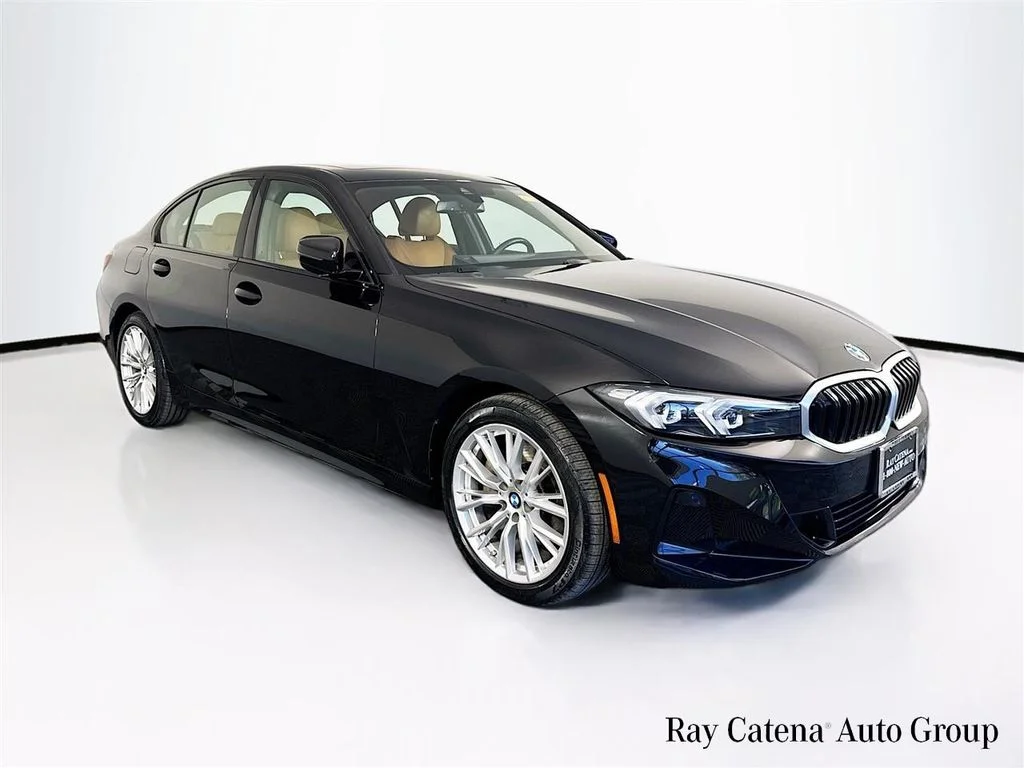 Used 2023 Black BMW 330i xDrive image 1