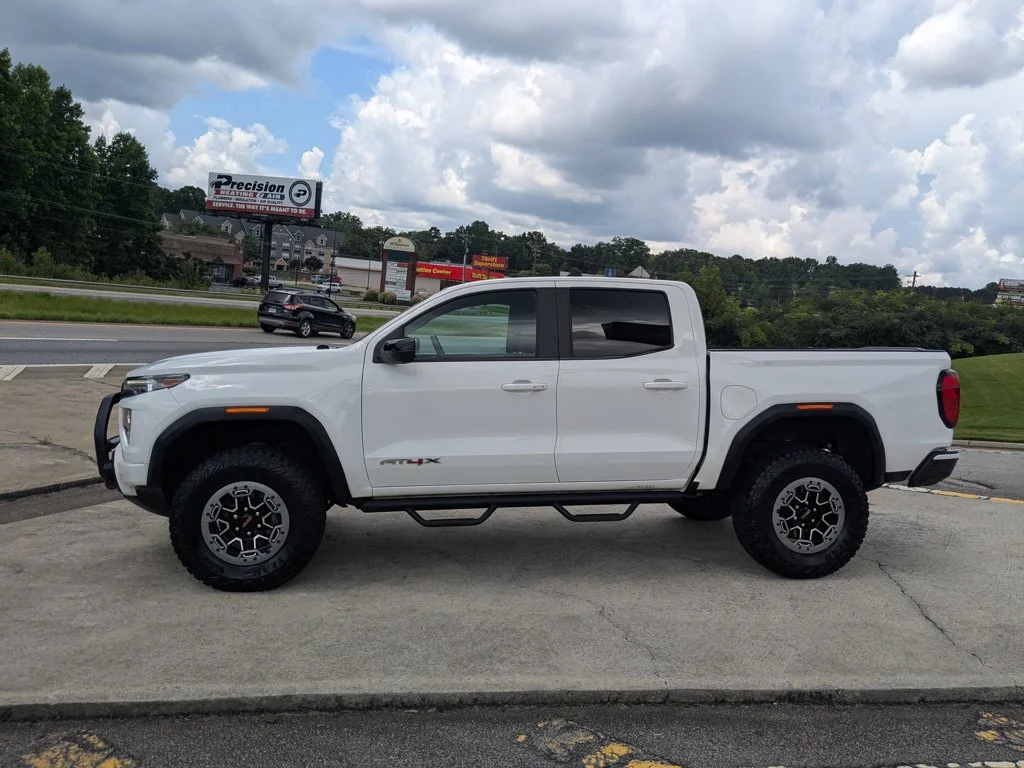 Used 2023 Summit White GMC 4WD AT4X image 8