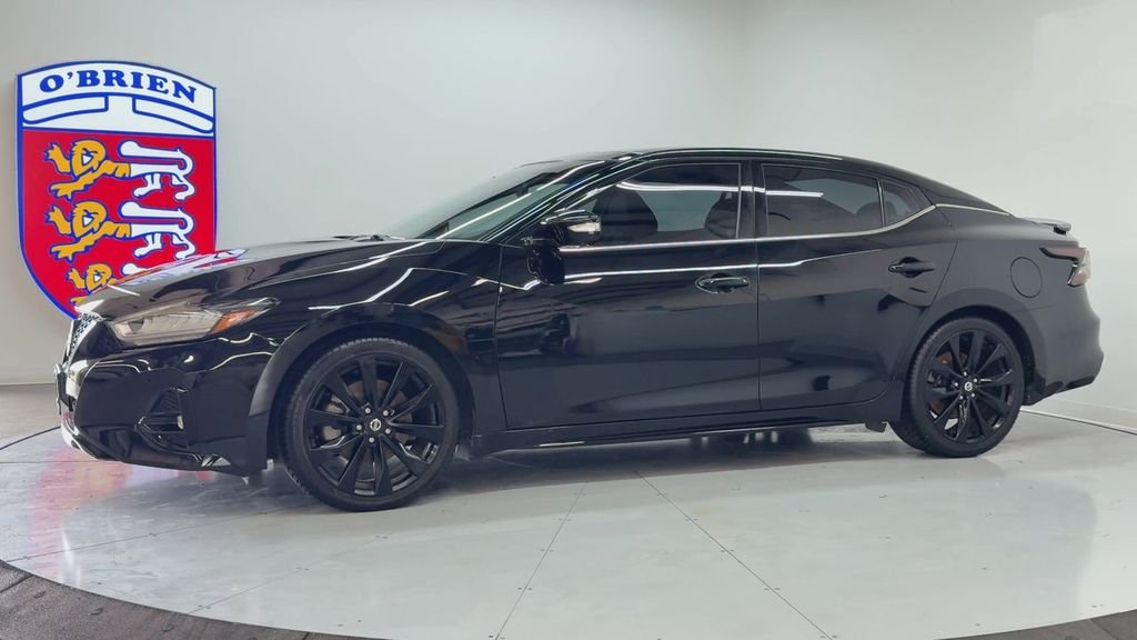 Used 2021 Super Black Nissan SR image 8