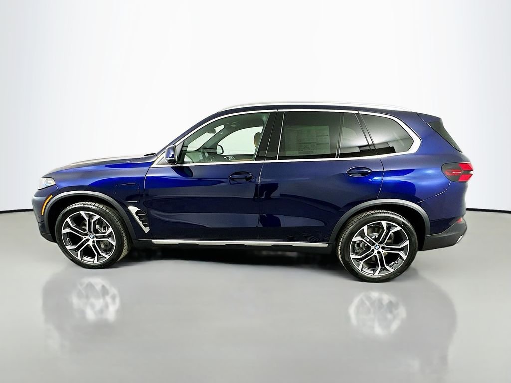 New 2026 Tanzanite Blue II Metallic BMW xDrive50e image 8