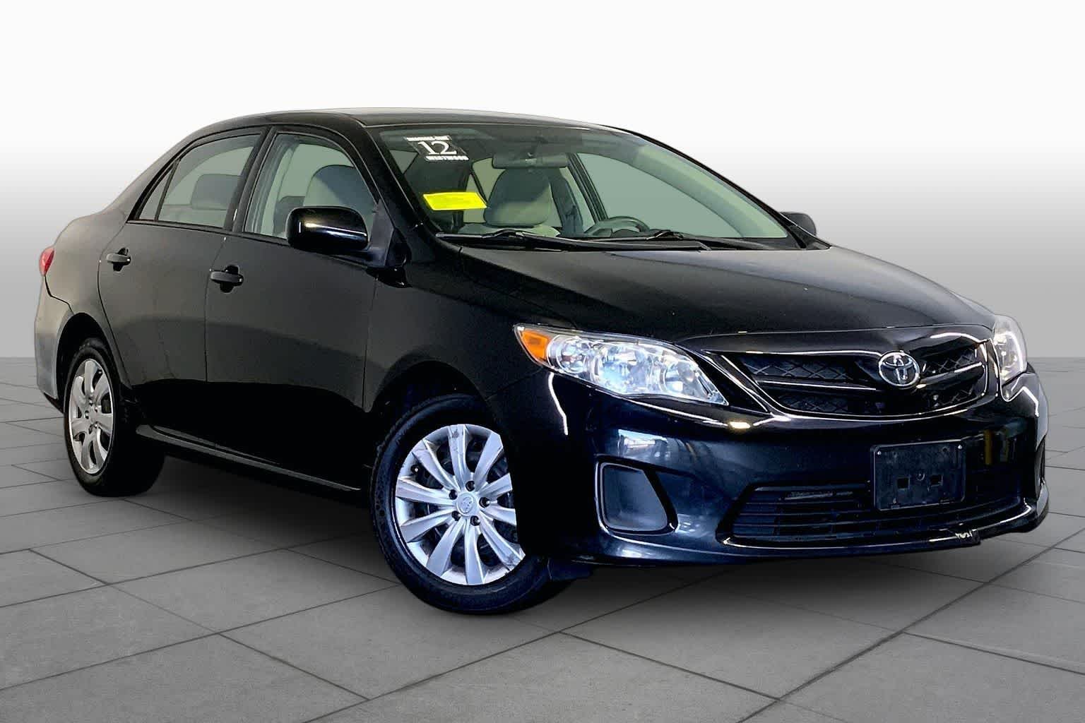 Used 2012 Black Sand Pearl Toyota LE image 2