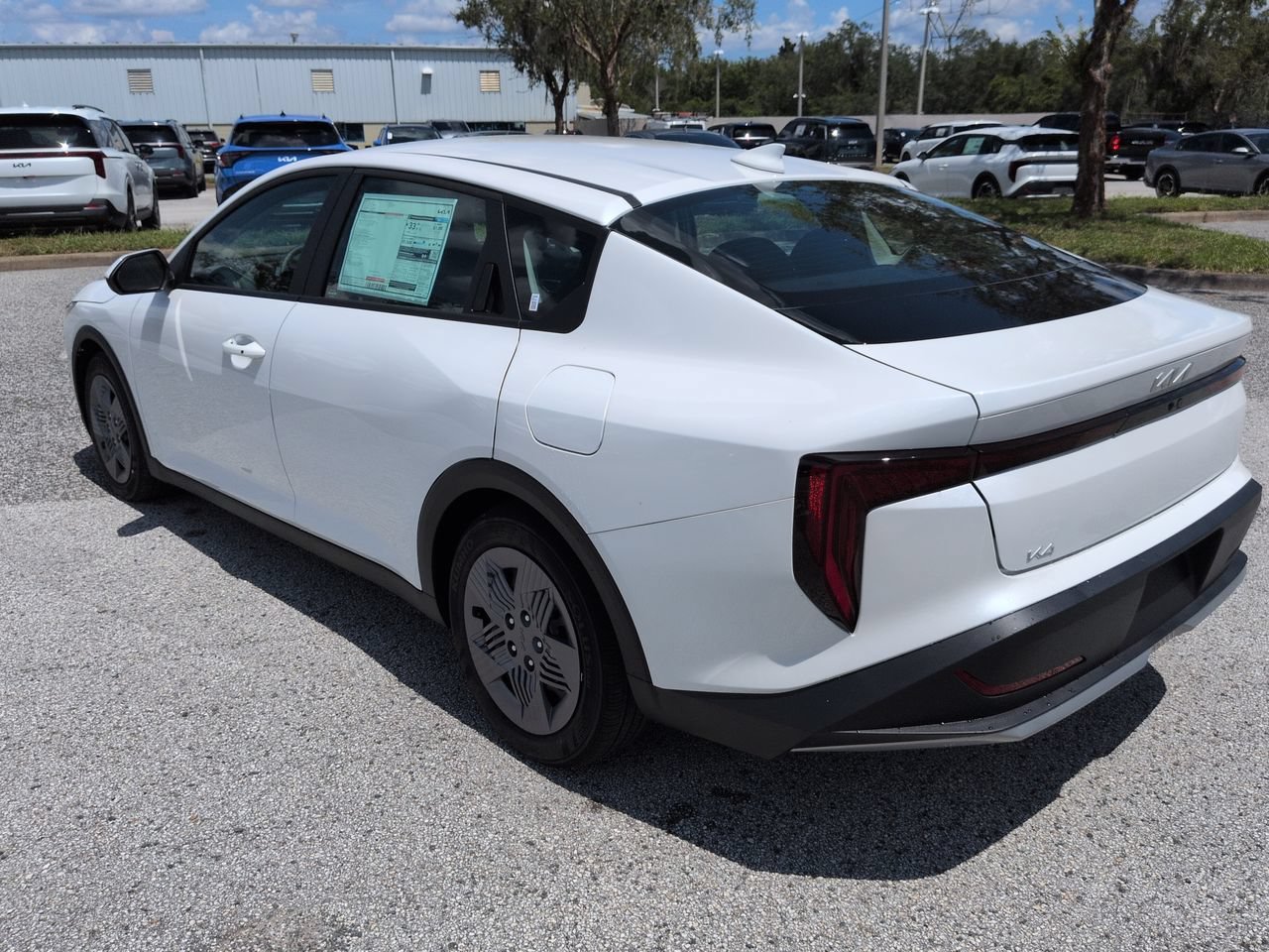 New 2026 Snow White Pearl Kia LX image 7