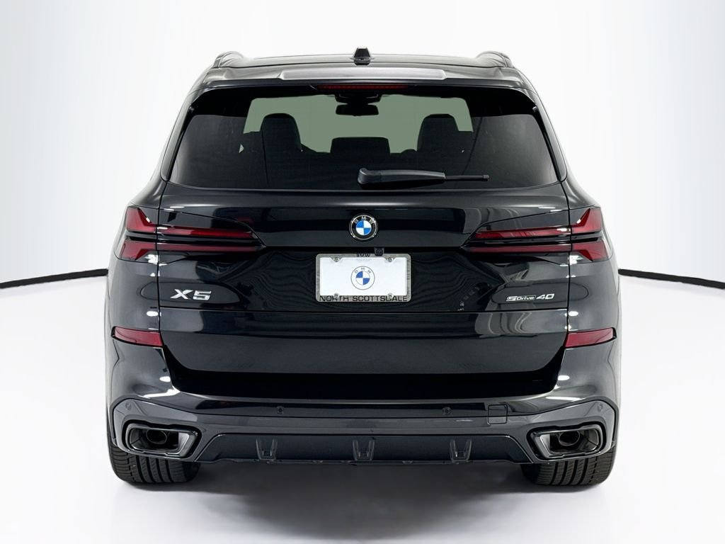 New 2026 Black Sapphire Metallic BMW sDrive40i image 6