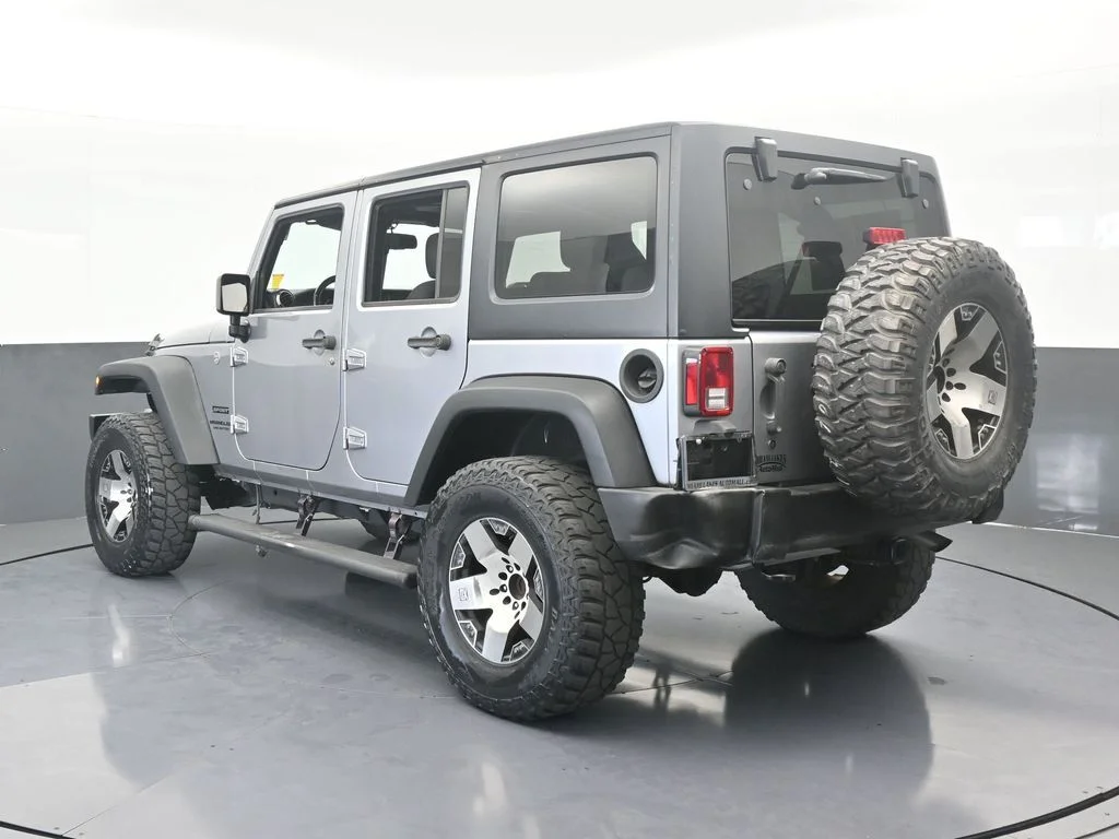 Used 2016 Billet Silver Metallic Clearcoat Jeep Unlimited Sport image 8