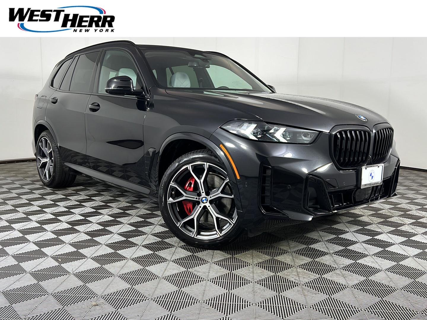 Used 2026 Black Sapphire Metallic BMW xDrive40i image 1
