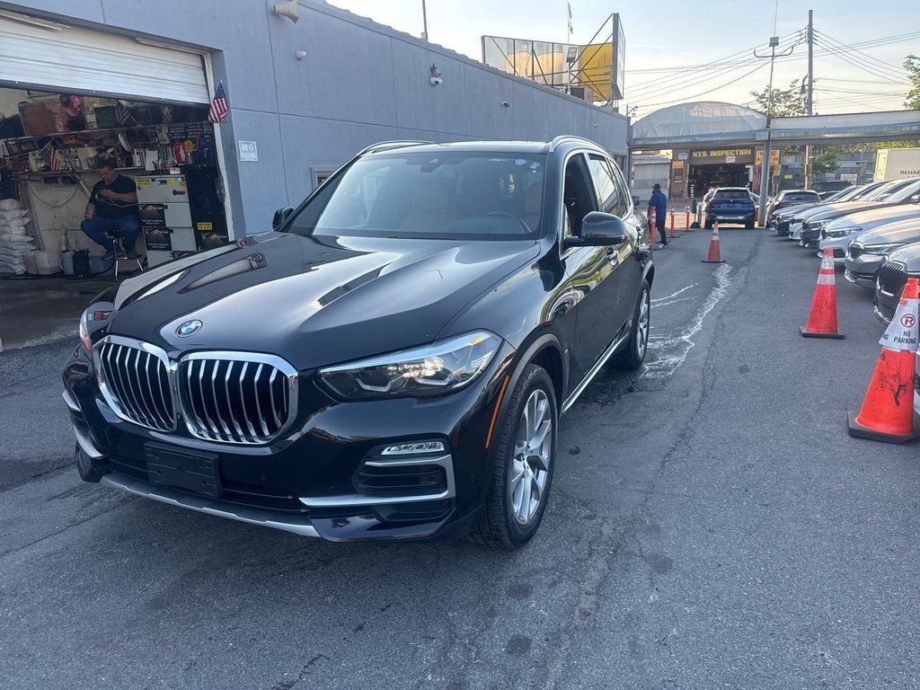 Used 2020 Black BMW xDrive50i image 1