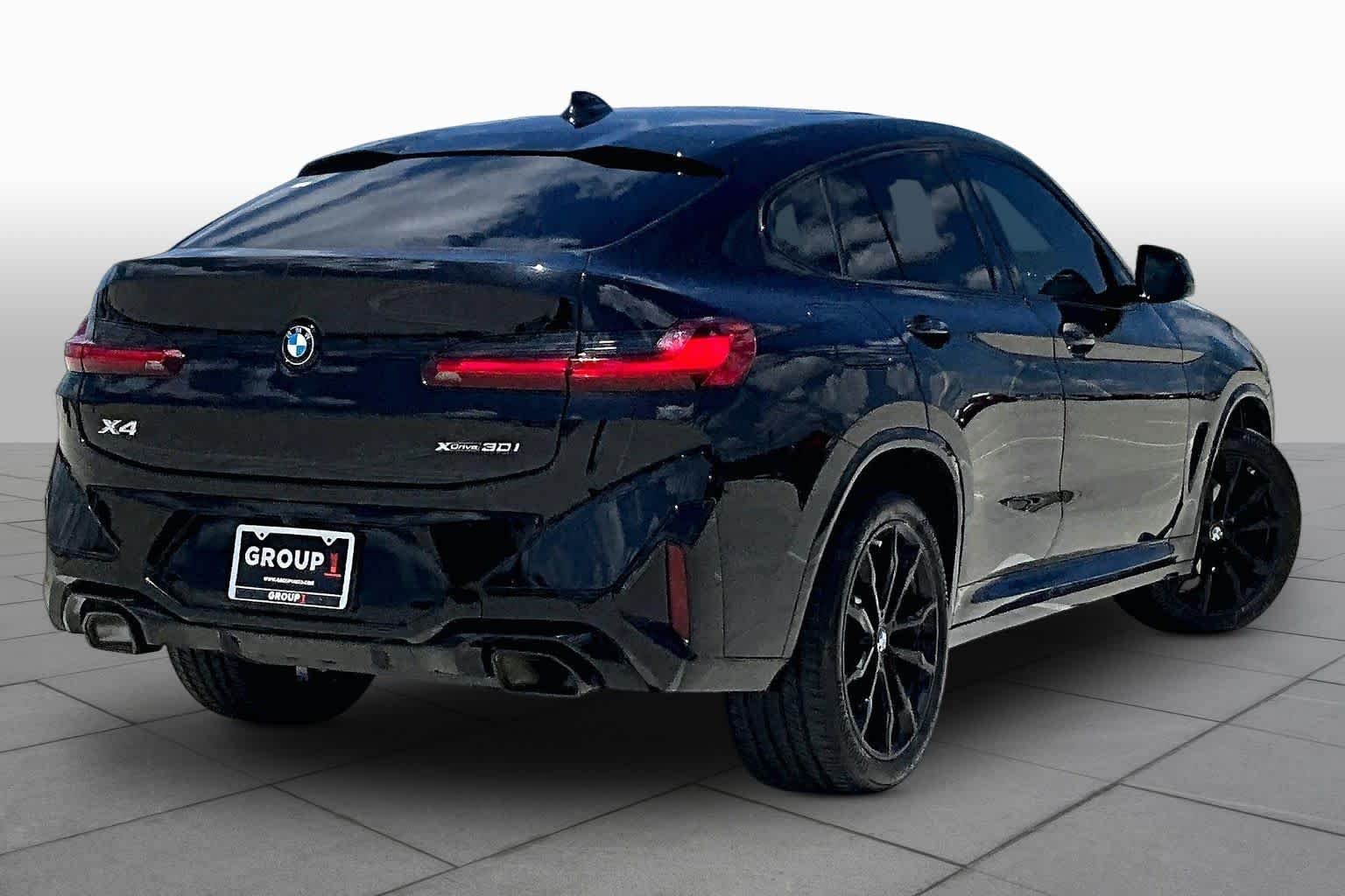 Used 2024 Black Sapphire Metallic BMW xDrive30i image 12