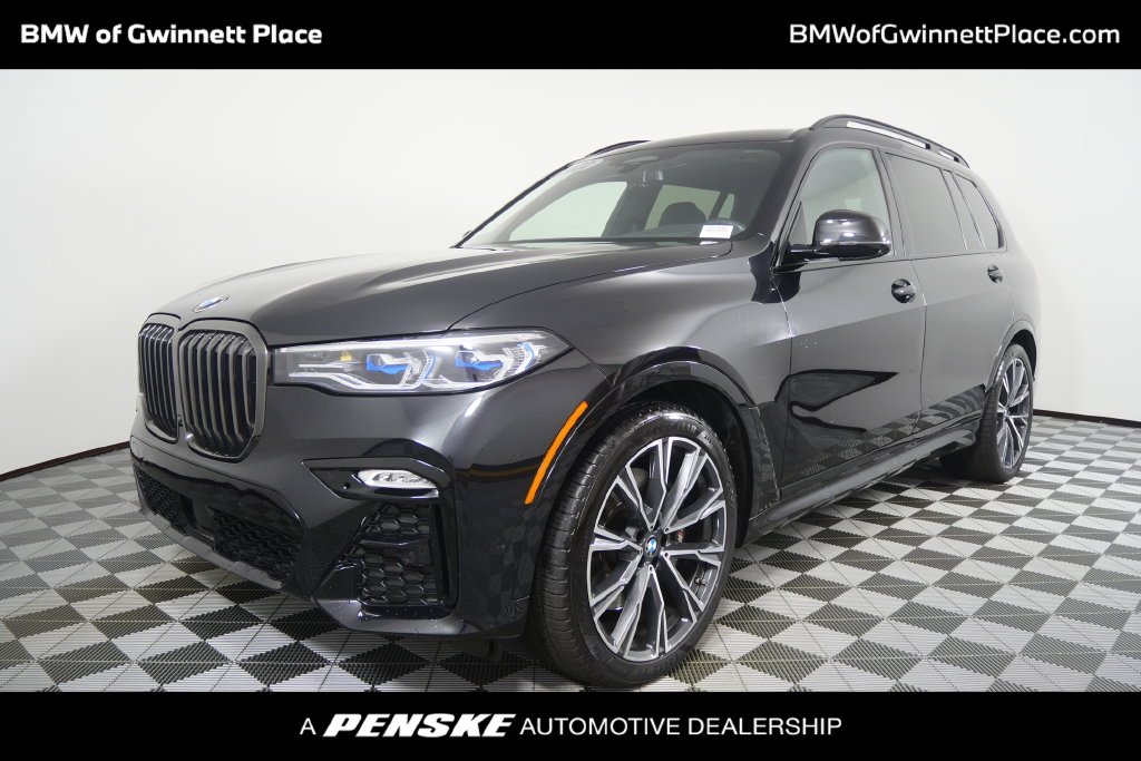 Used 2022 Black Sapphire Metallic BMW M50i image 1