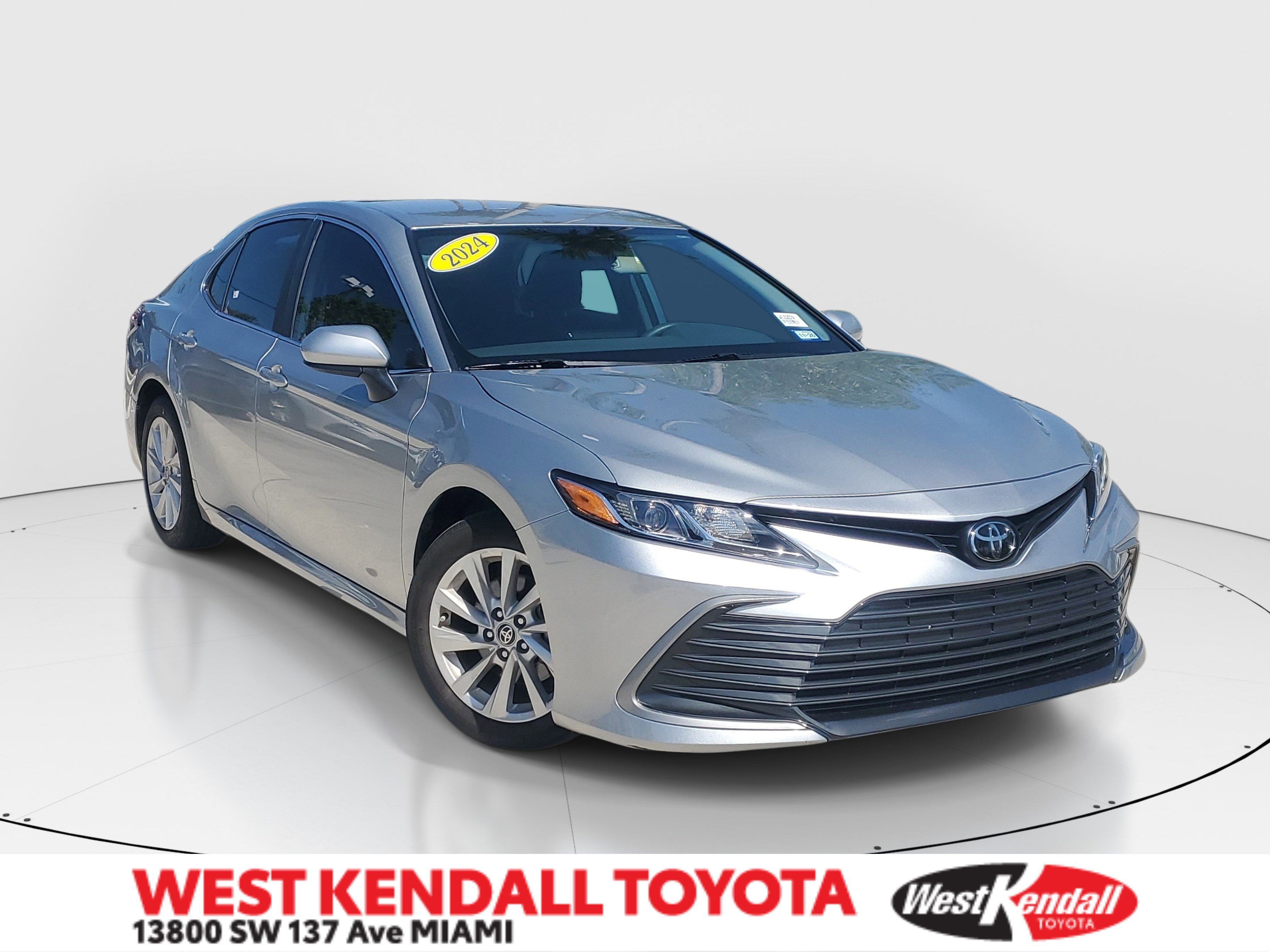 Used 2024 Celestial Silver Metallic Toyota LE image 1