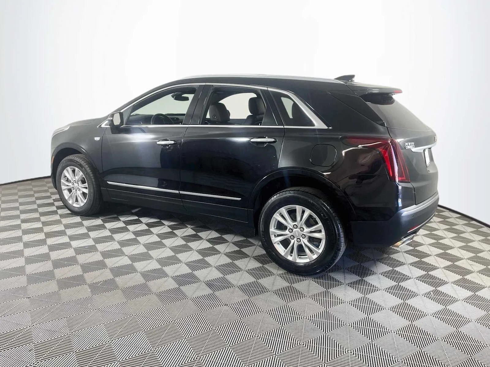 Used 2024 Stellar Black Metallic Cadillac FWD Luxury image 6