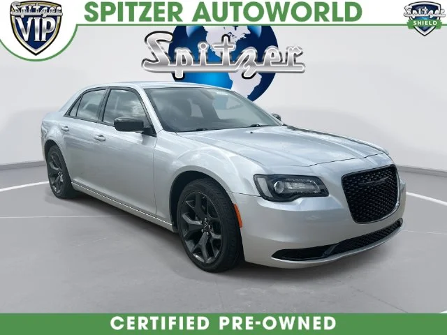Used 2023 Silver Chrysler Touring image 1