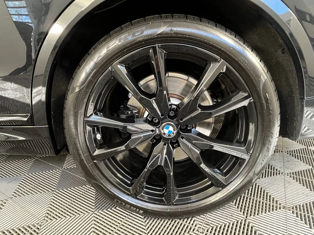 Certified Used 2025 Black Sapphire Metallic BMW xDrive40i image 13