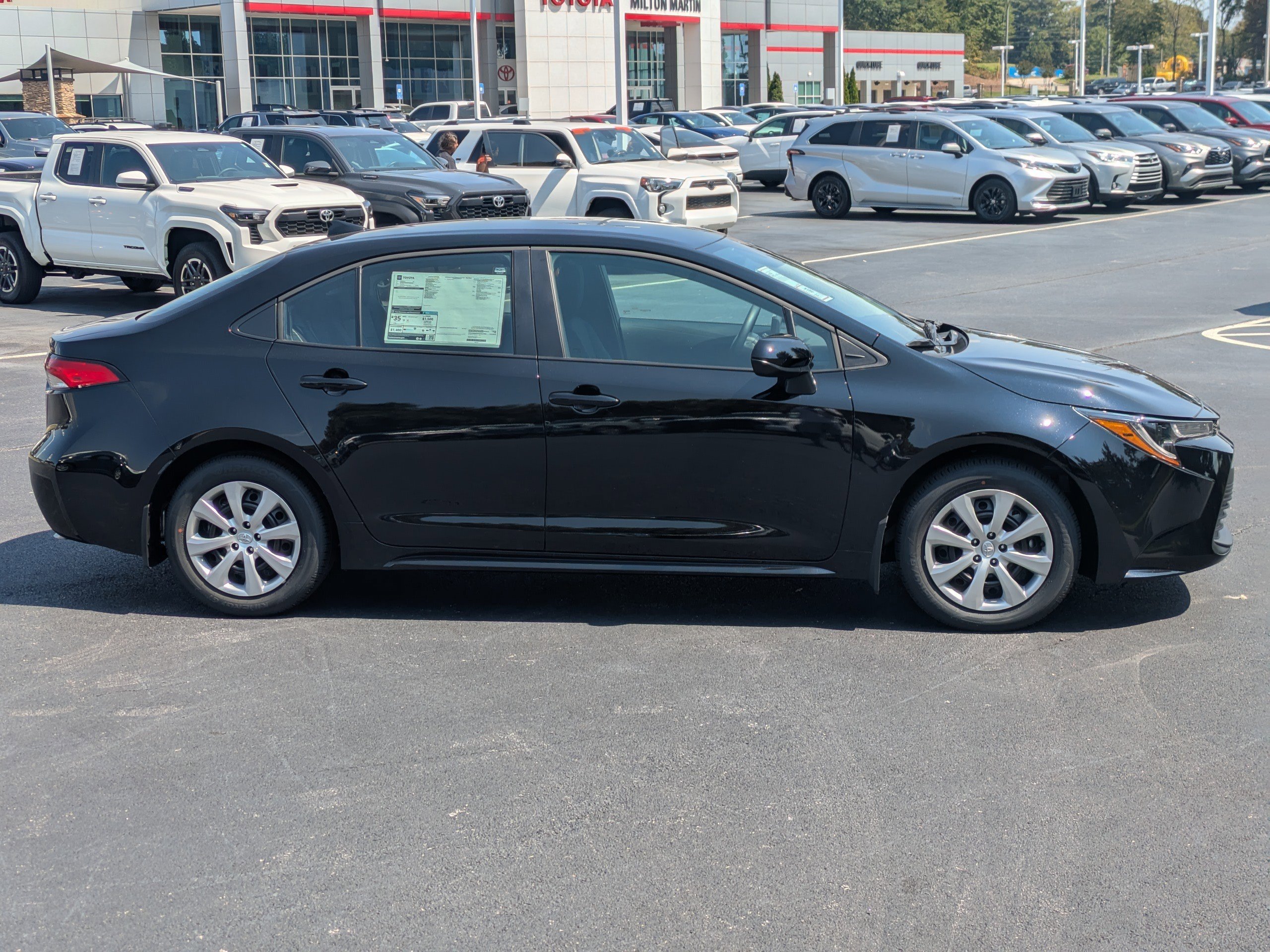 New 2026 Black Toyota LE image 3