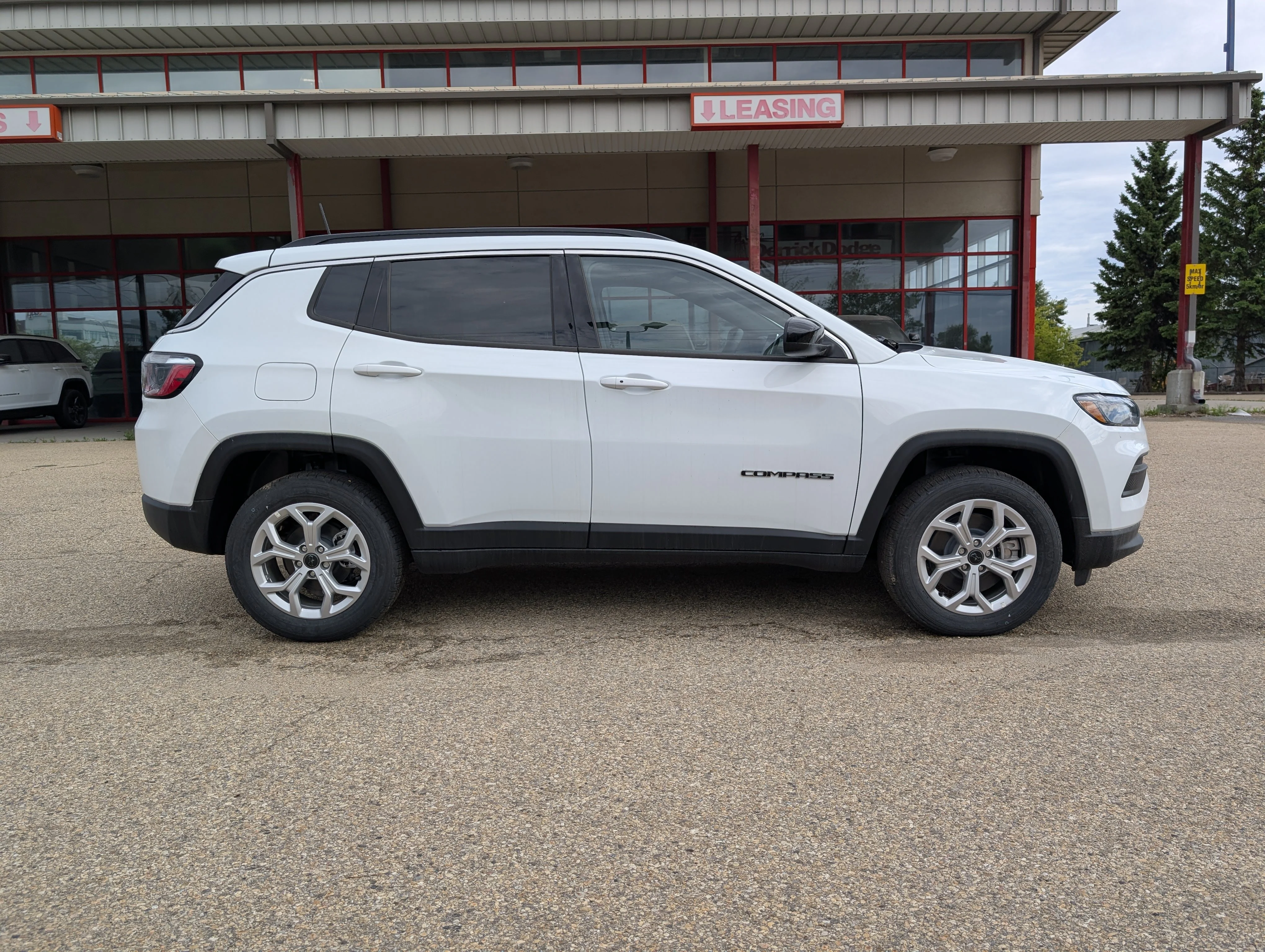 New 2026 Bright White Jeep North image 8
