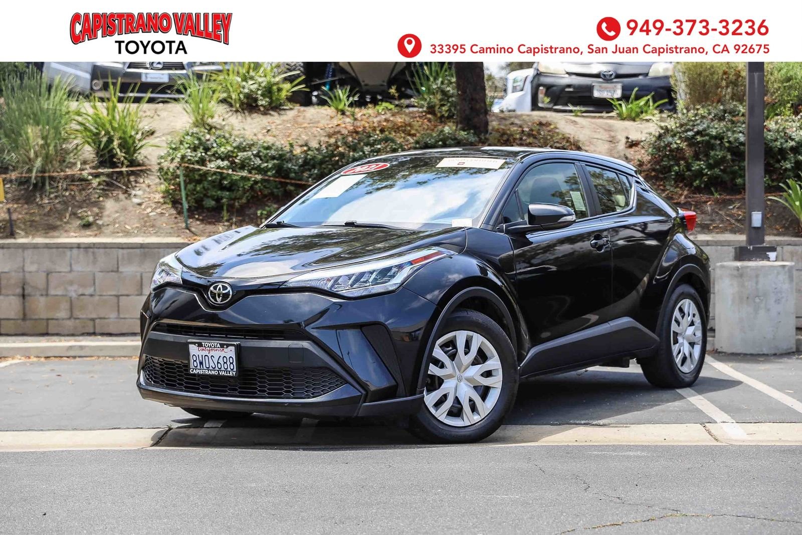 Certified Used 2021 BLACK SAND PEARL Toyota LE image 1