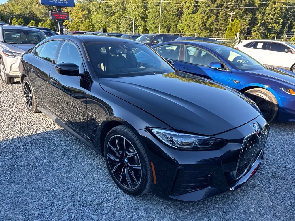 Used 2024 Black BMW eDrive40 image 2