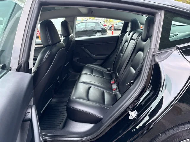 Used 2023 Solid Black Tesla Base image 15