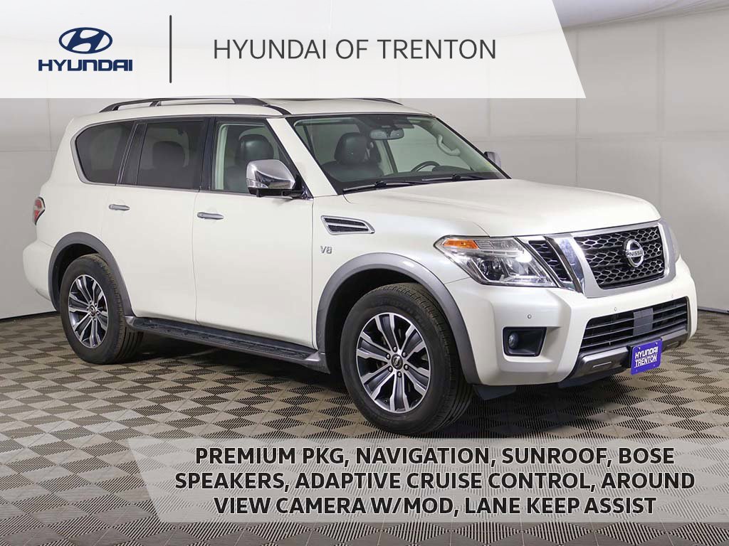 Used 2019 White Nissan SL image 1