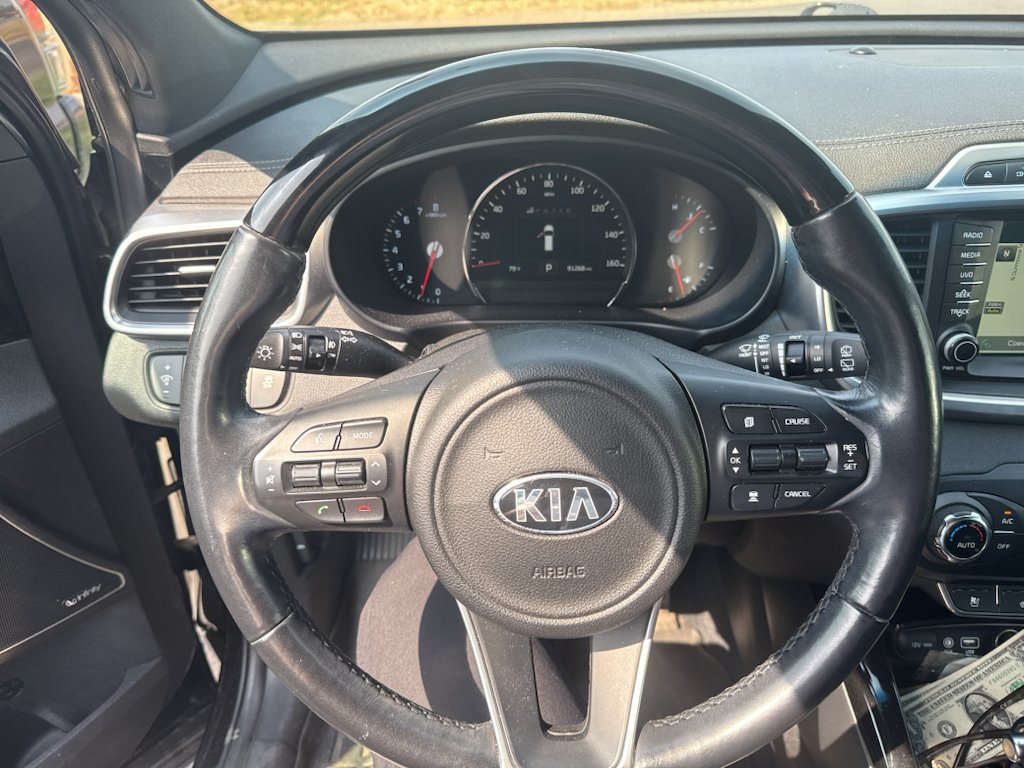 Used 2016 Ebony Black Kia SXL image 2