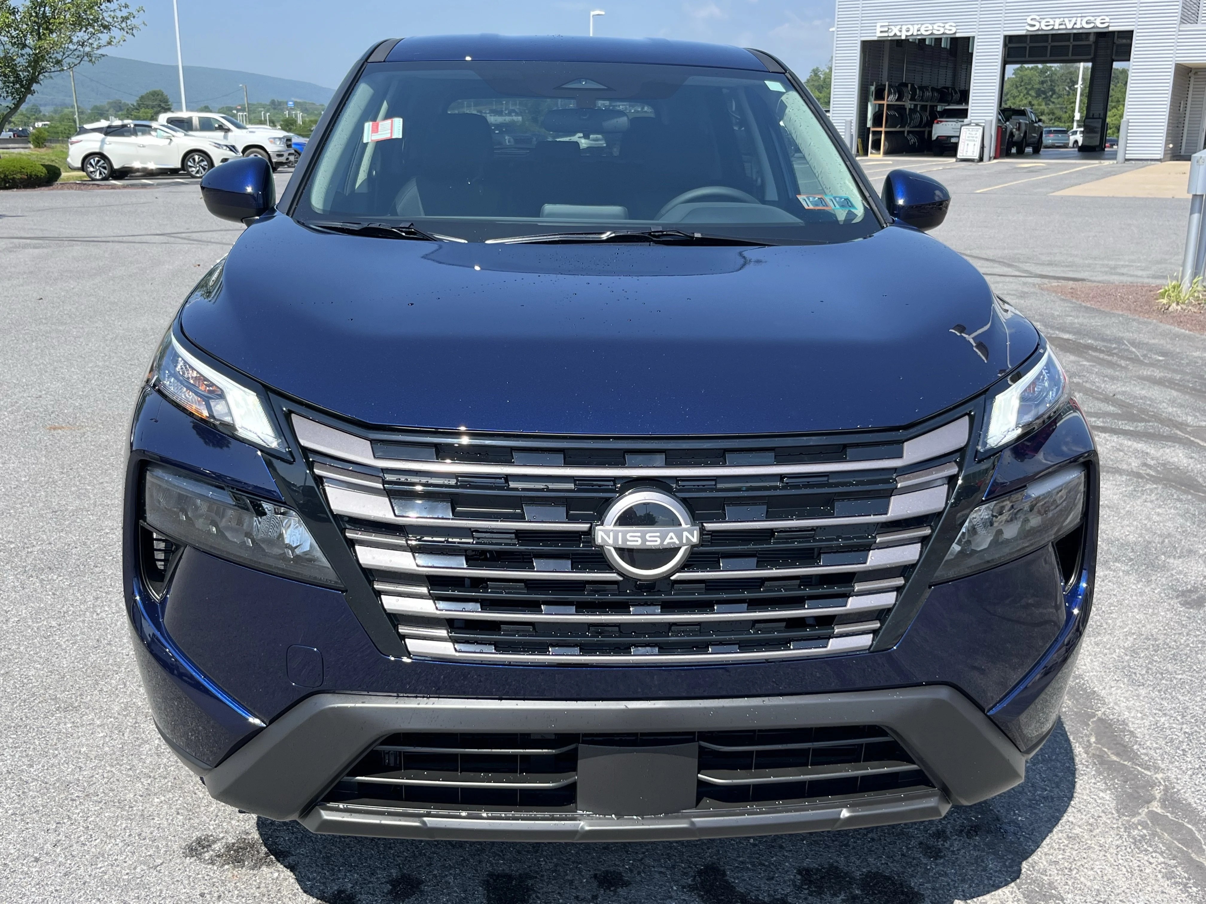 New 2026 Deep Ocean Blue Pearl Nissan SV image 12